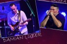 Jest to plakat zapowiadający Koncert Walentynkowy. Na bordowym tle z serduszkami umieszczono zdjęcia dwóch muzyków: Damiana Lubera grającego na gitarze oraz Jacka Szuły grającego na harmonijce ustnej. Tekst informuje, że wydarzenie odbędzie się 14 lutego 2020 o godz. 18:30 w kawiarni C@fe Kultura. Bilety kosztują 15 zł i były dostępne od 27 stycznia 2020 roku. Na dole widnieją loga organizatorów: Strzelecki Ośrodek Kultury, C@fe Kultura oraz kod QR
