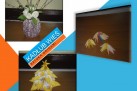 Trzy zdjęcia rękodzieła wykonane metodą origami znajdujące się na niebiesko-biało-pomarańczowym tle z napisem ,,KADŁUB WIEŚ', ,,SZTUKA ORIGAMI'.